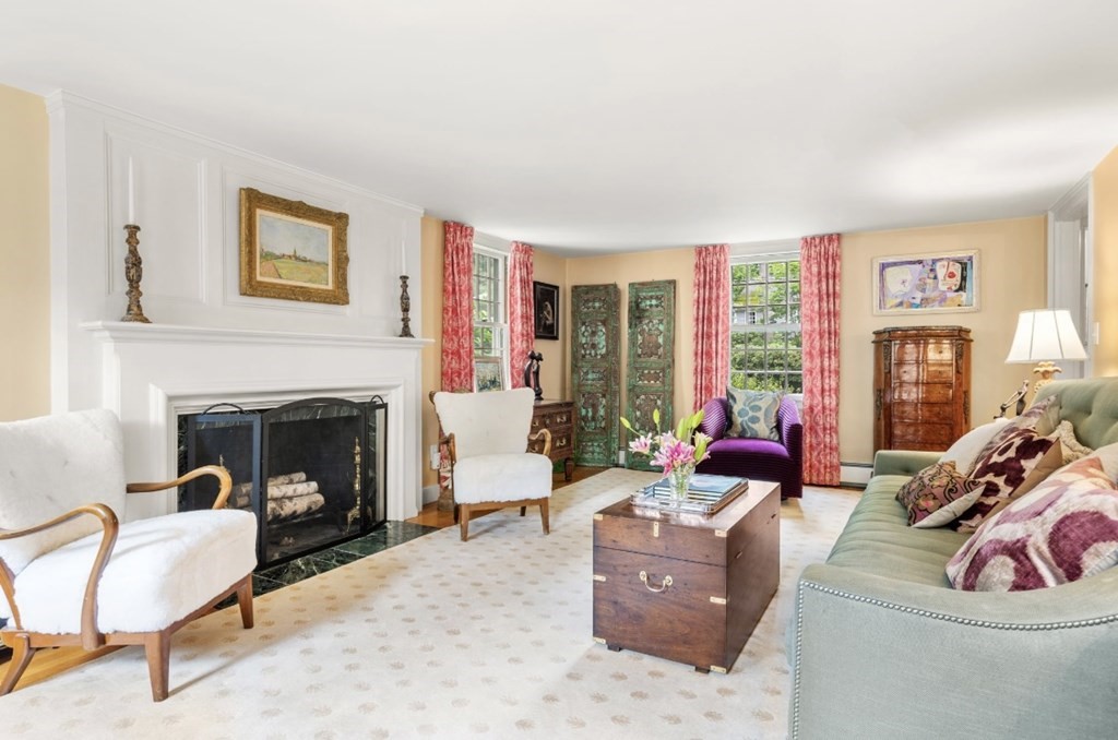 217 Conant Road Weston, MA 02493 - Photo 5 of 30 a living room with furniture large window and a fireplace