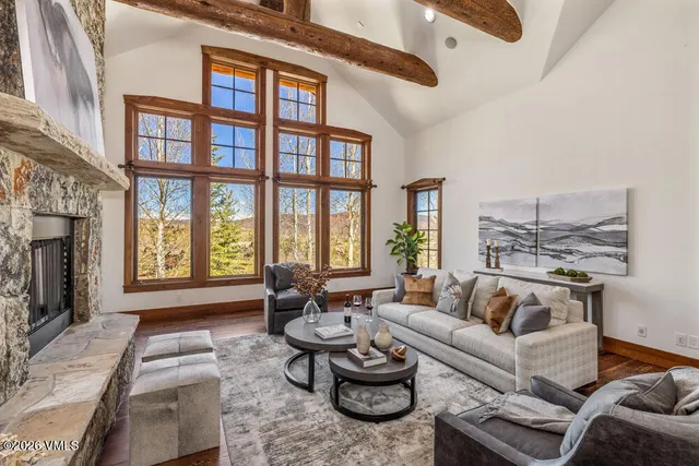 a living room with furniture and a window