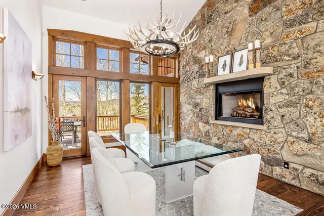 a kitchen with granite countertop cabinets stainless steel appliances and a counter space