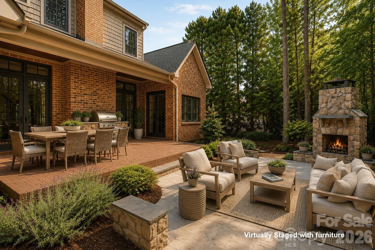 508 Hideaway Ridge Court Matthews, NC 28105 - Photo 36 of 47 a view of a patio with couches table and chairs and potted plants