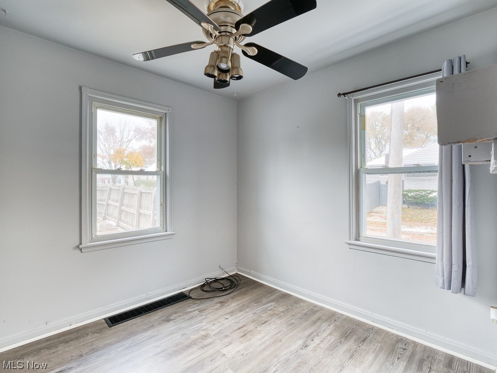 3774 Highland Road Cleveland, OH 44111 - Photo 28 of 31 Empty room featuring ceiling fan and light hardwood / wood-style flooring