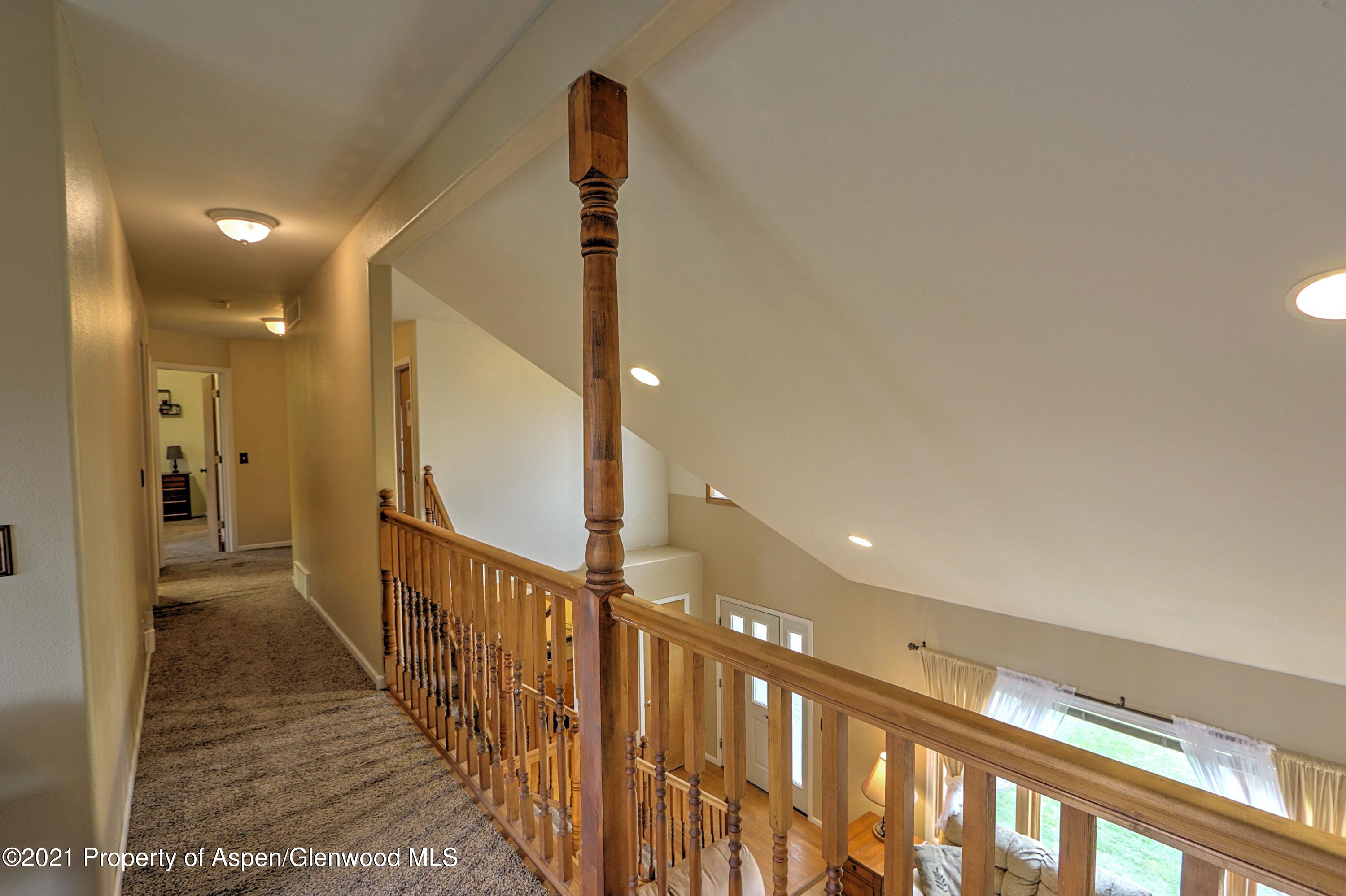 1075 Hickory Drive Rifle, CO 81650 - Photo 18 of 29 a view of hallway with stairs