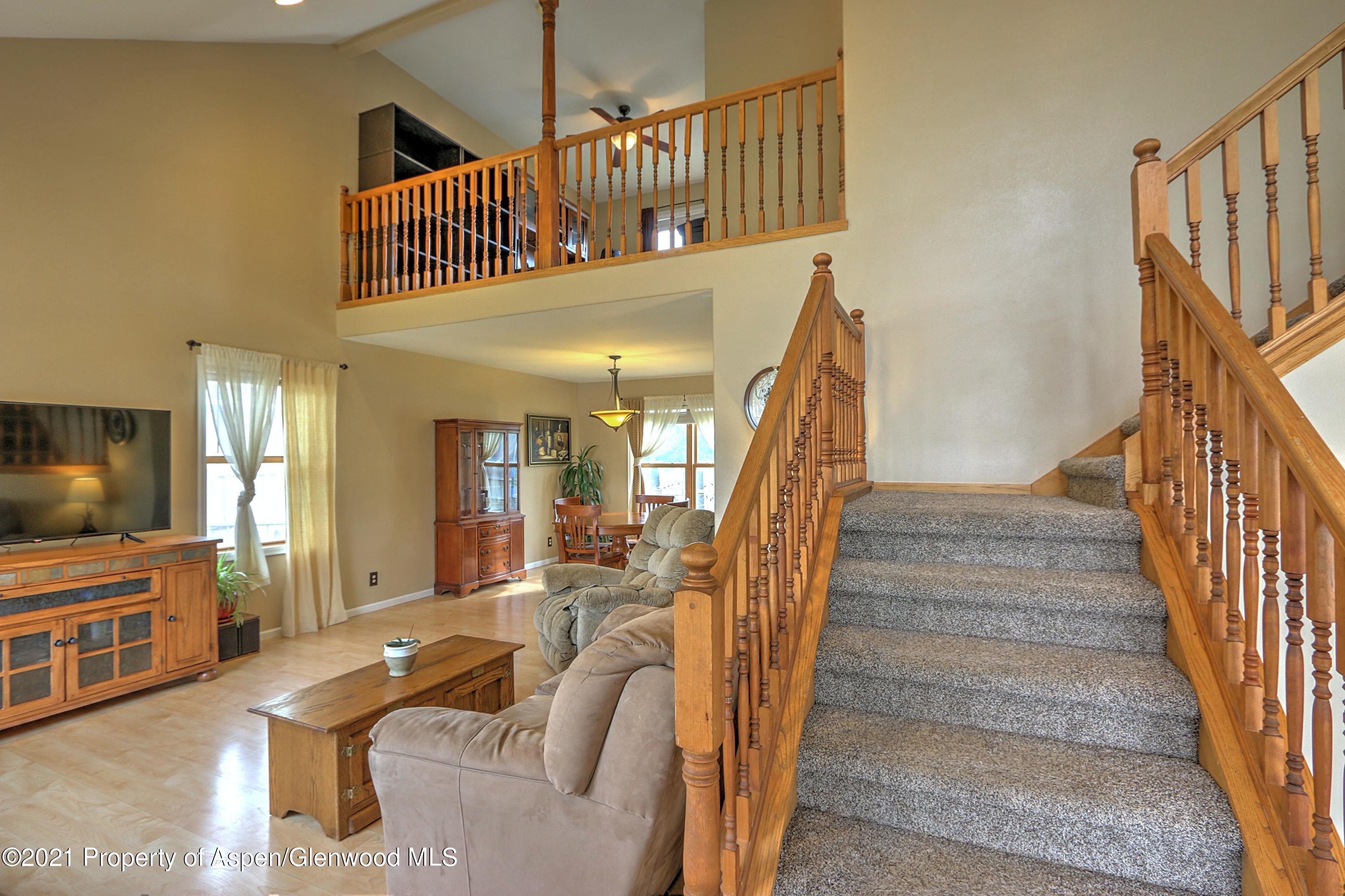1075 Hickory Drive Rifle, CO 81650 - Photo 3 of 29 a view of entryway and hall with wooden floor