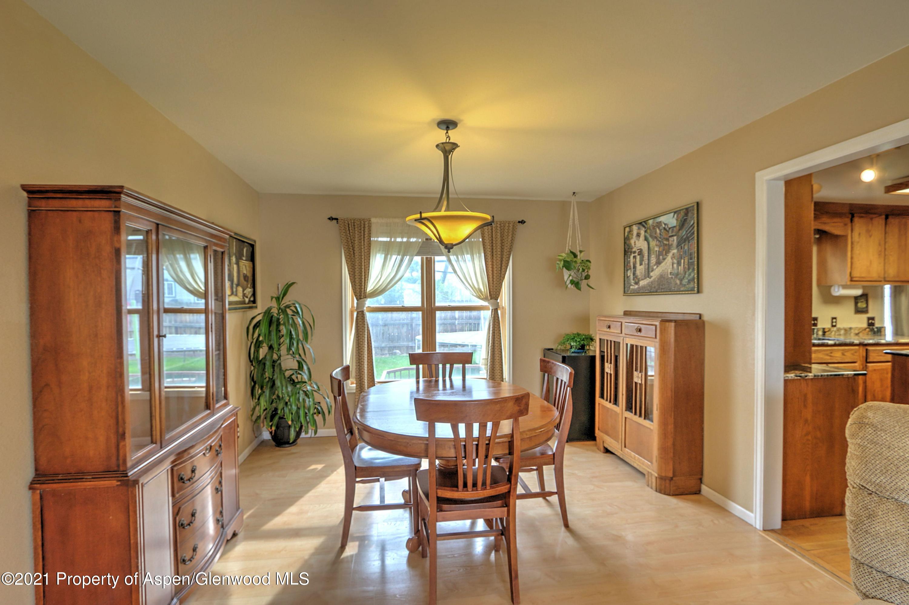 1075 Hickory Drive Rifle, CO 81650 - Photo 4 of 29 a dining room with furniture and window