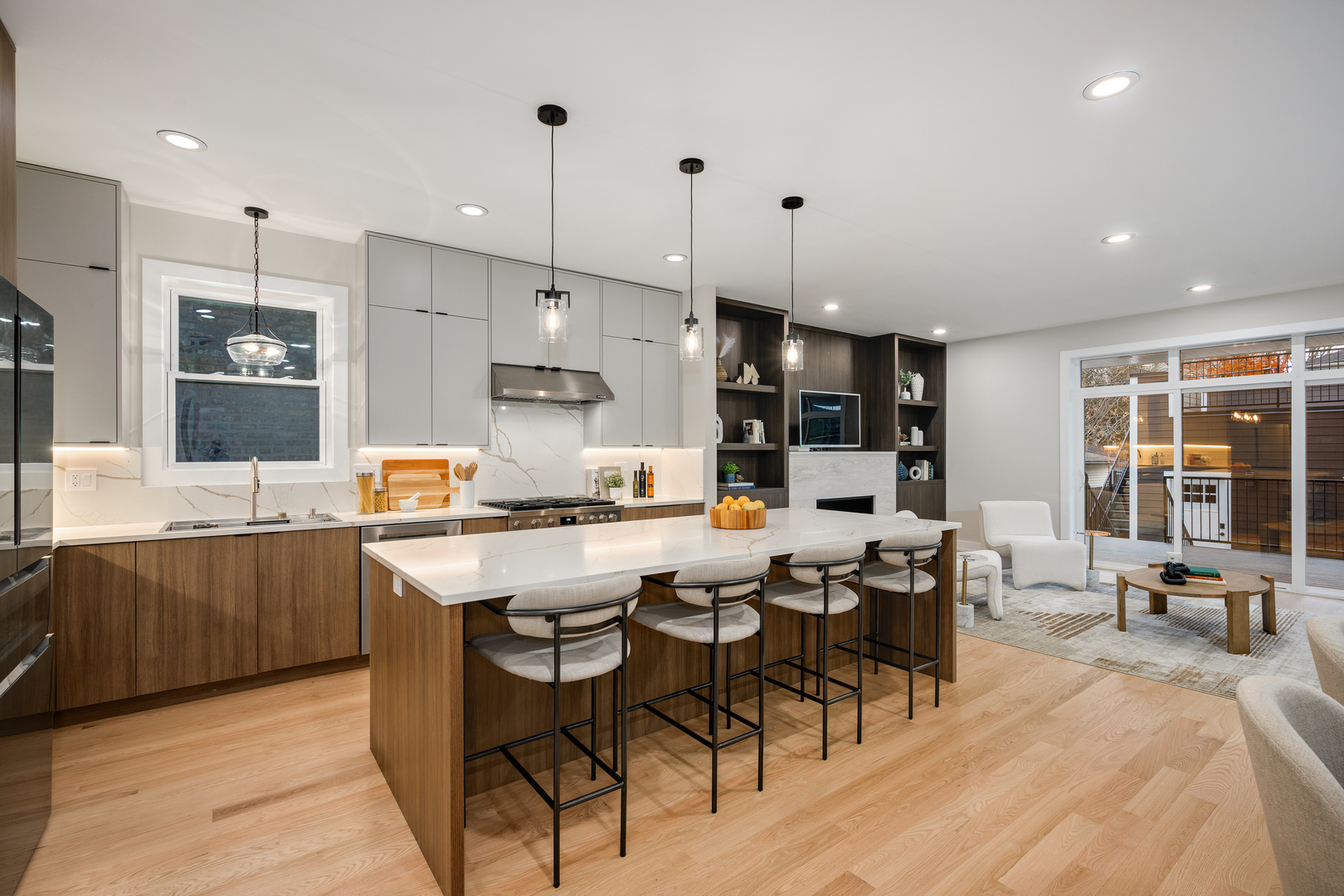 2225 West Carmen Avenue Chicago, IL 60625 - Photo 11 of 45 a large kitchen with lots of counter and chairs