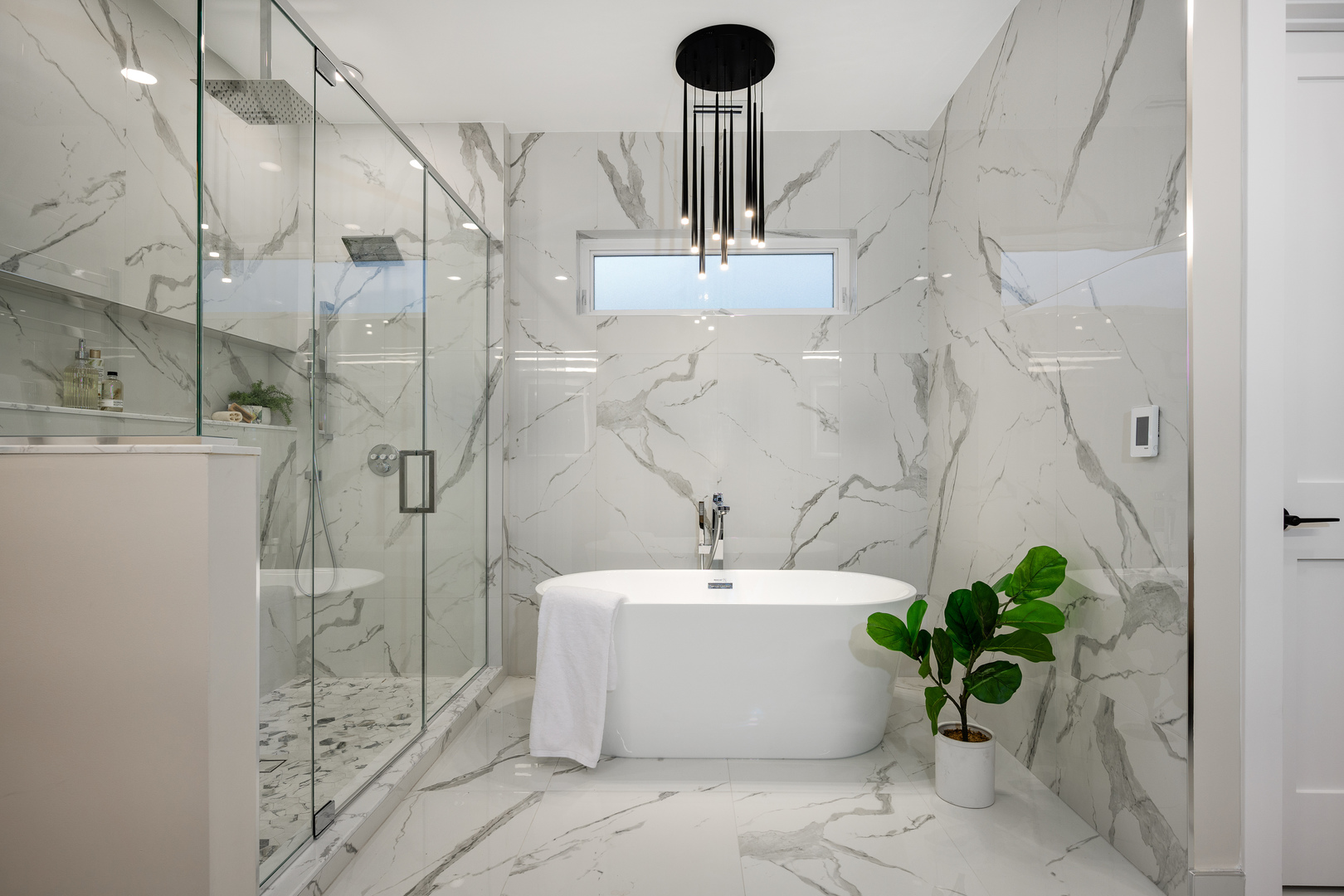 2225 West Carmen Avenue Chicago, IL 60625 - Photo 41 of 45 a white bath tub sitting next to a white sink