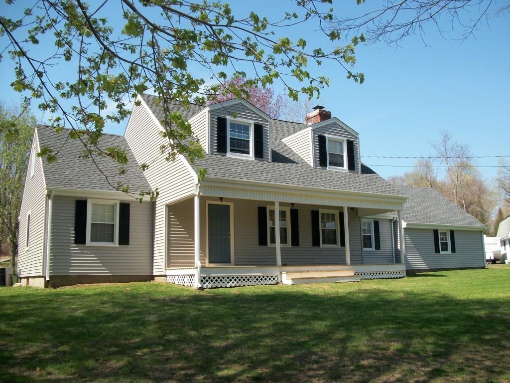 685 Durham Road Madison, CT 06443 - Photo 1 of 1 a front view of a house with a garden