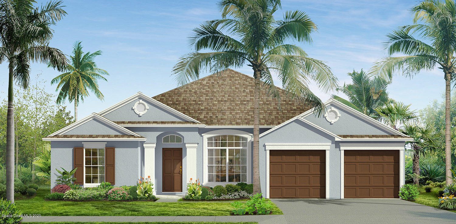 2342 Angel Road Palm Bay, FL 32909 - Photo 1 of 2 a front view of a house with a garden