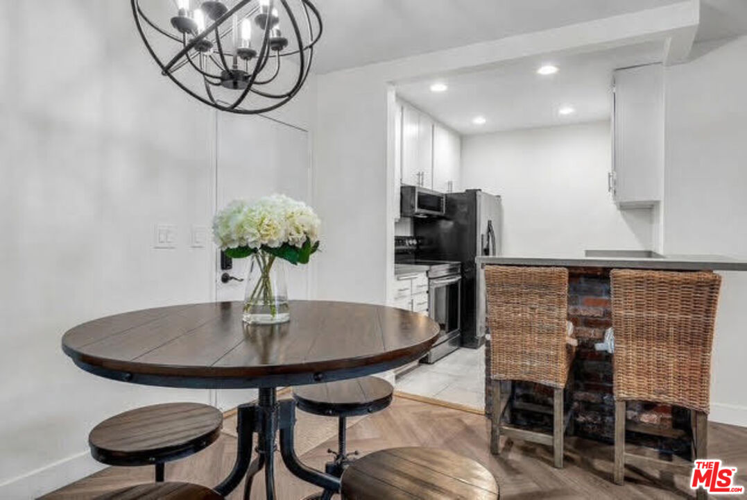 7740 Redlands Street, Unit G3092 Playa del Rey, CA 90293 - Photo 12 of 37 a dining room with furniture