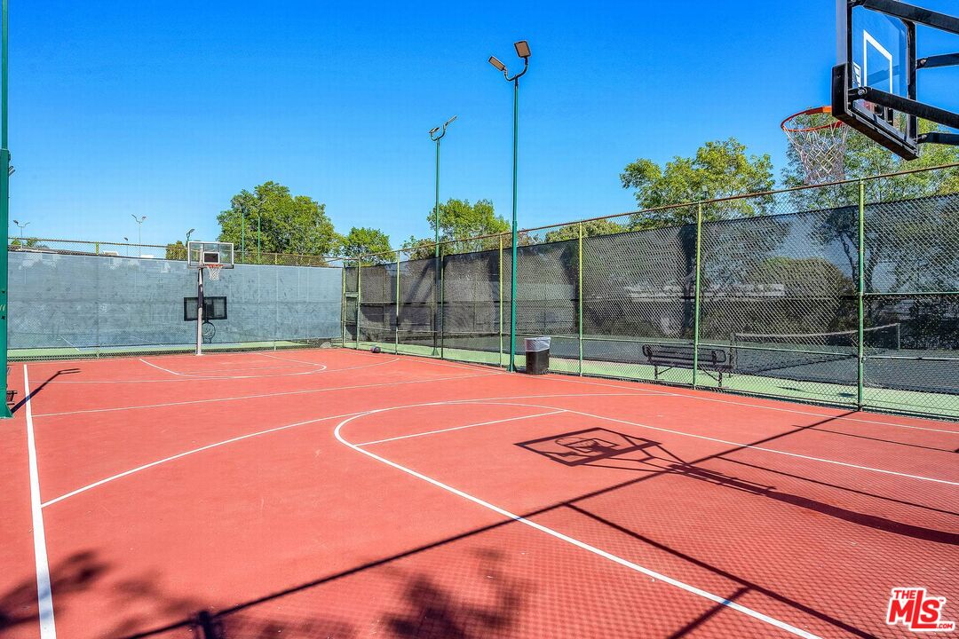 7740 Redlands Street, Unit G3092 Playa del Rey, CA 90293 - Photo 27 of 37 a view of a tennis court with a basket ball court