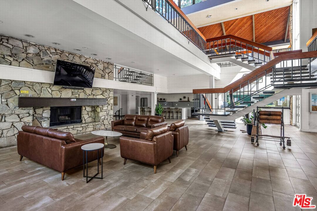 7740 Redlands Street, Unit G3092 Playa del Rey, CA 90293 - Photo 31 of 37 a living room with furniture and a fireplace