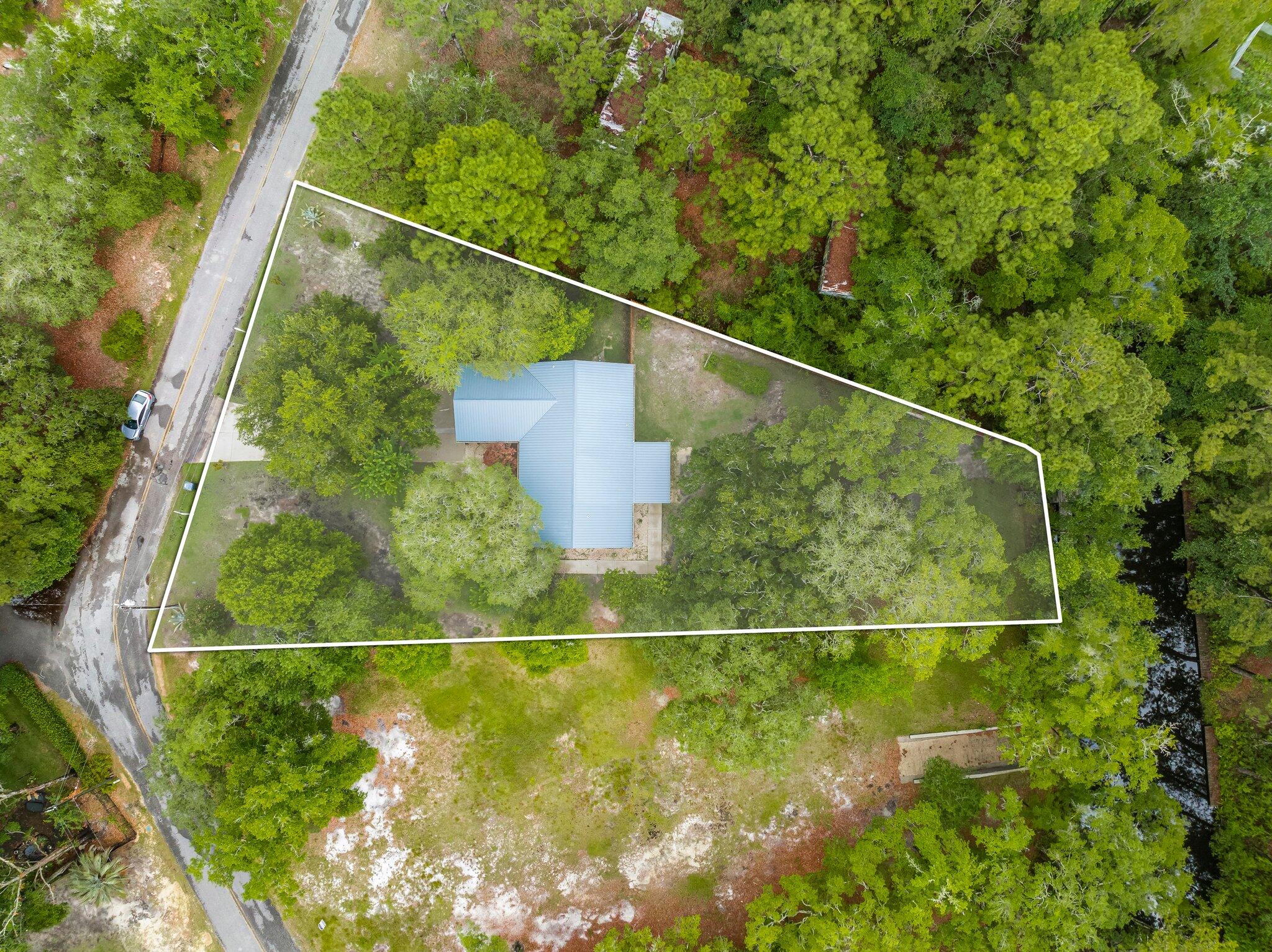 107 Rodney Drive Freeport, FL 32439 - Photo 31 of 34 a view of a tennis court