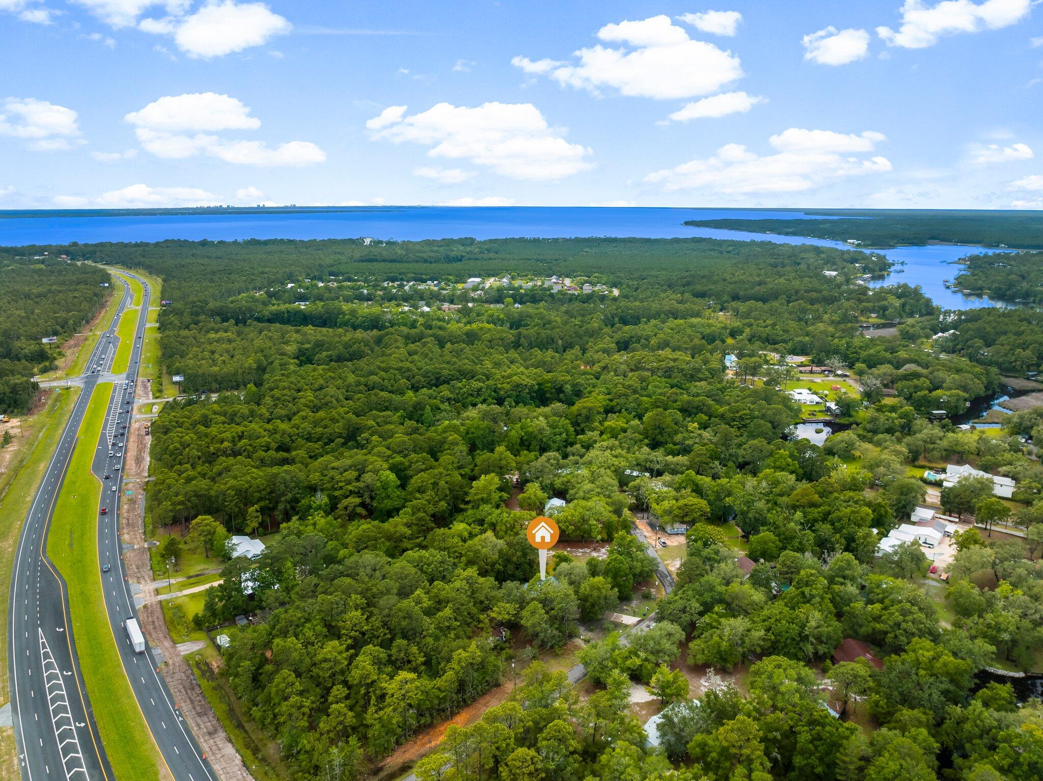 107 Rodney Drive Freeport, FL 32439 - Photo 32 of 34 a view of a yard with an outdoor space