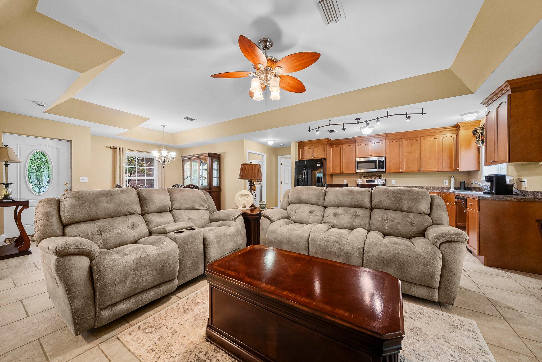 107 Rodney Drive Freeport, FL 32439 - Photo 7 of 34 a living room with furniture and kitchen view