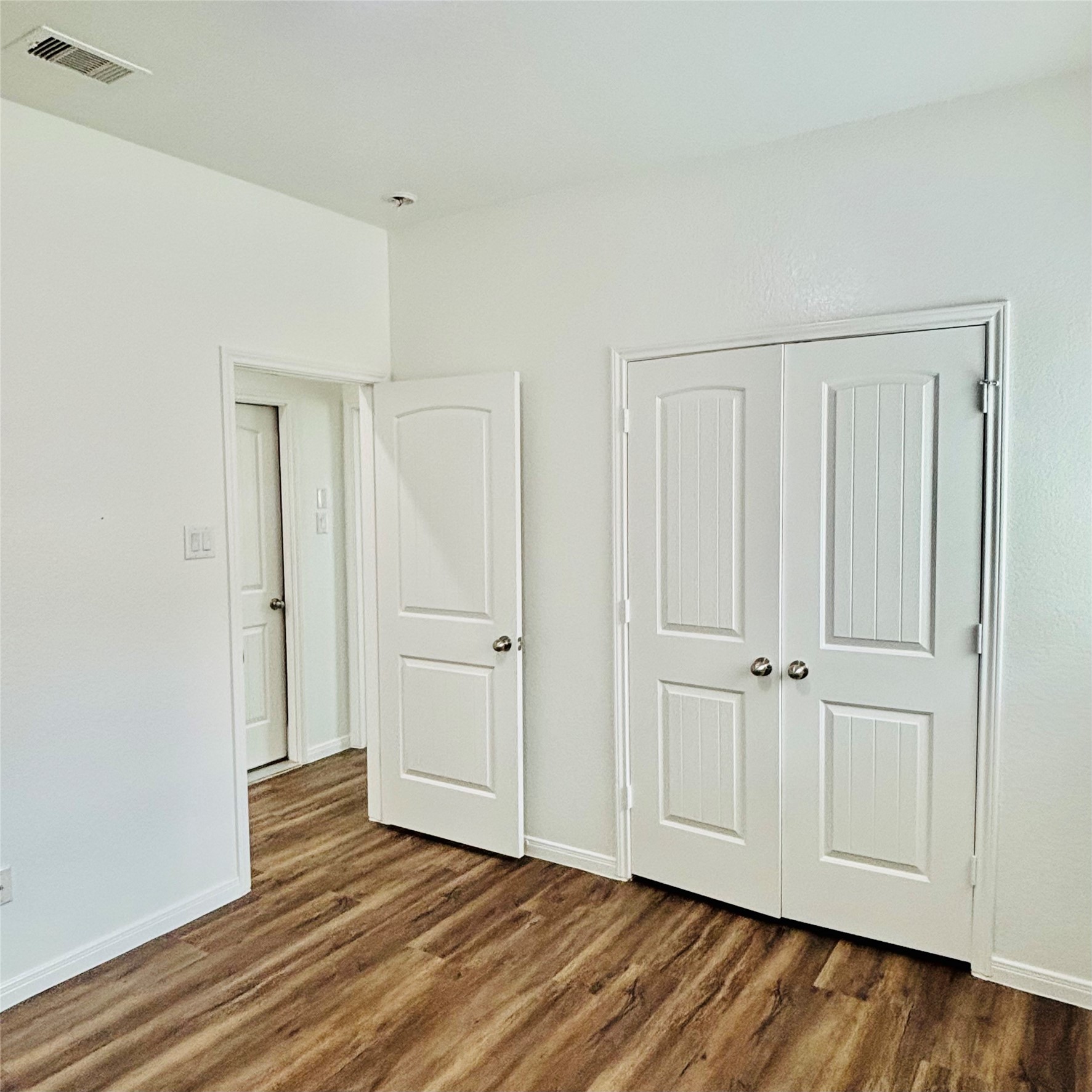 22480 Toronado Ridge Lane Porter, TX 77365 - Photo 18 of 42 a view of empty room with wooden floor