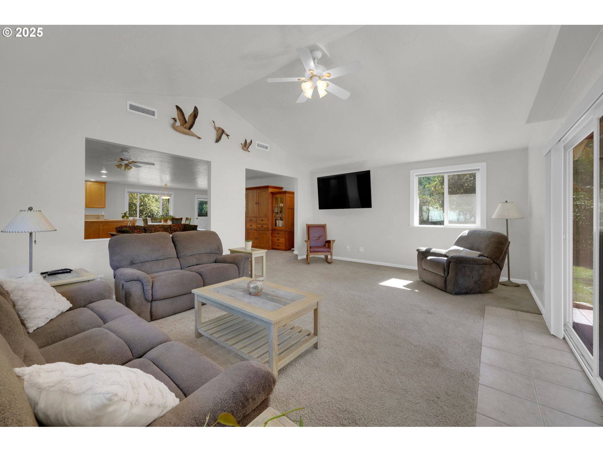 89550 Dick Way Florence, OR 97439 - Photo 12 of 39 a living room with furniture and a flat screen tv