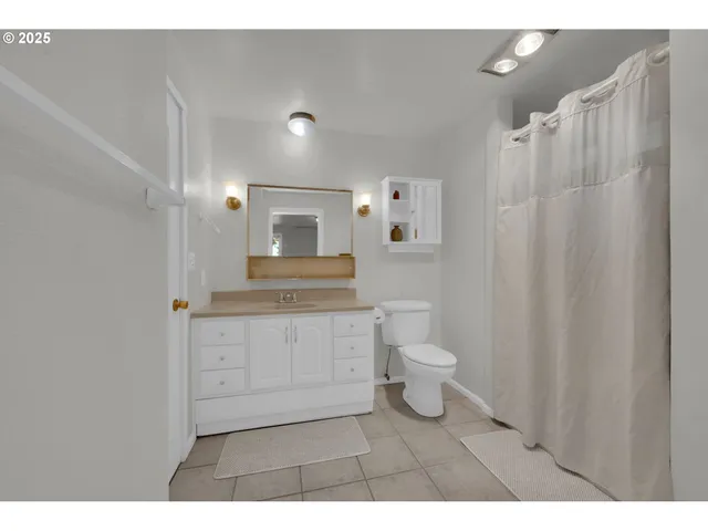 a workspace with furniture and a window