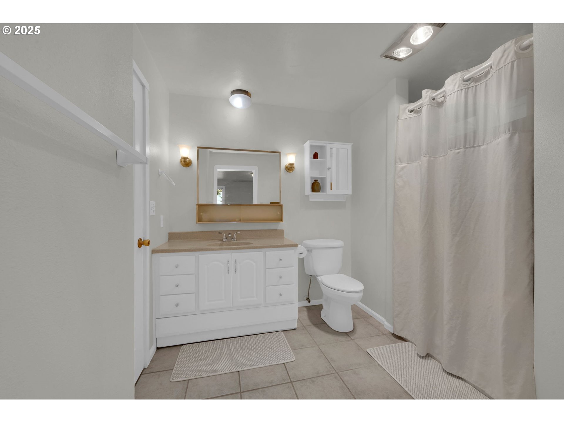 89550 Dick Way Florence, OR 97439 - Photo 22 of 39 a bathroom with a toilet a sink and a mirror