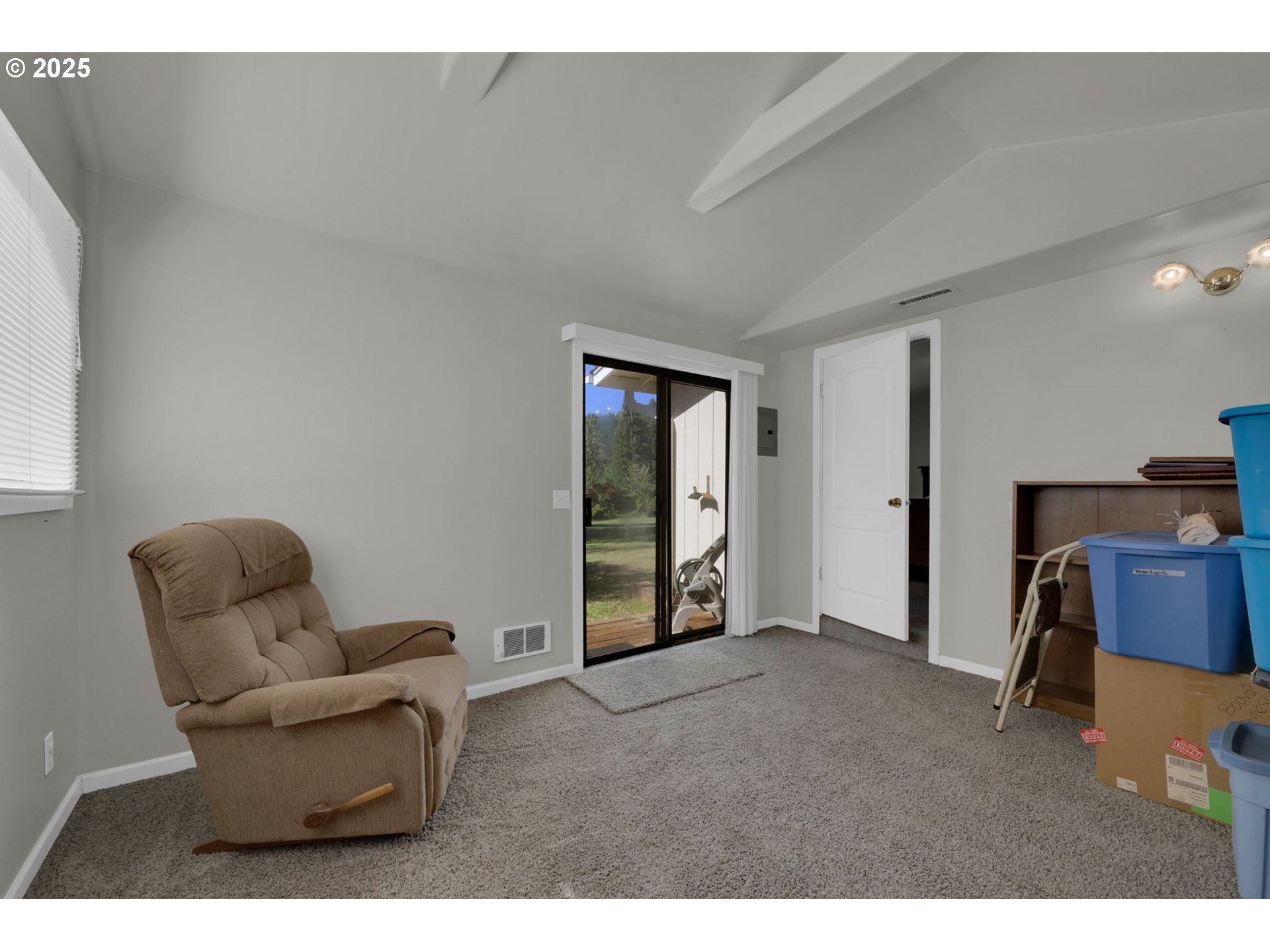 89550 Dick Way Florence, OR 97439 - Photo 24 of 39 a living room with furniture and a window