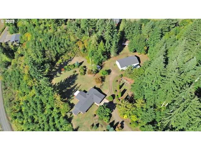 a open area with mountains in the background