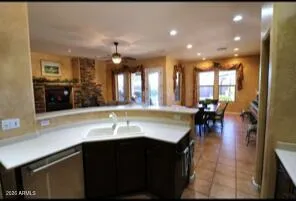 a view of a living room and kitchen