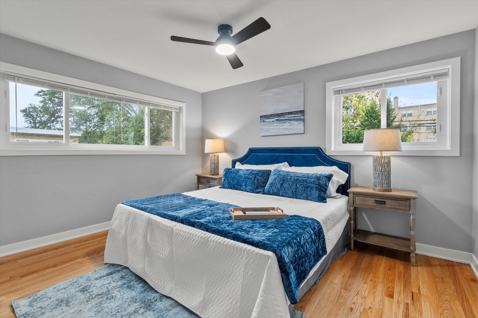 7249 North Campbell Avenue, Unit B Chicago, IL 60645 - Photo 12 of 27 a bedroom with a bed and a window