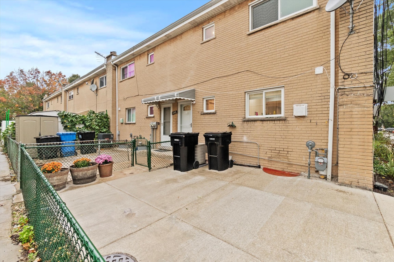 7249 North Campbell Avenue, Unit B Chicago, IL 60645 - Photo 27 of 27 a view of a patio with dining table and chairs