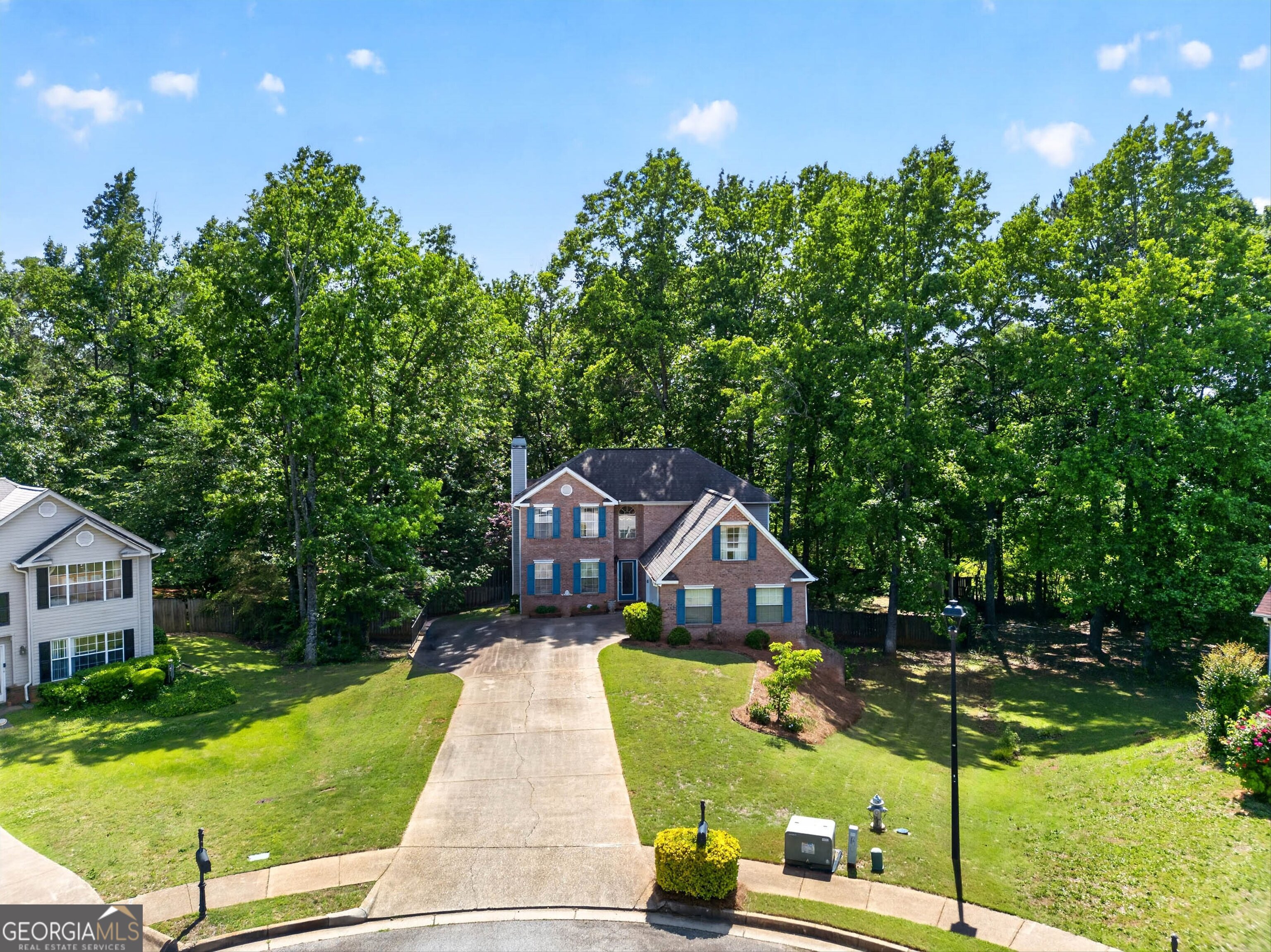 101 Emerald Lane Hampton, GA 30228 - Photo 60 of 72 a front view of a house with garden