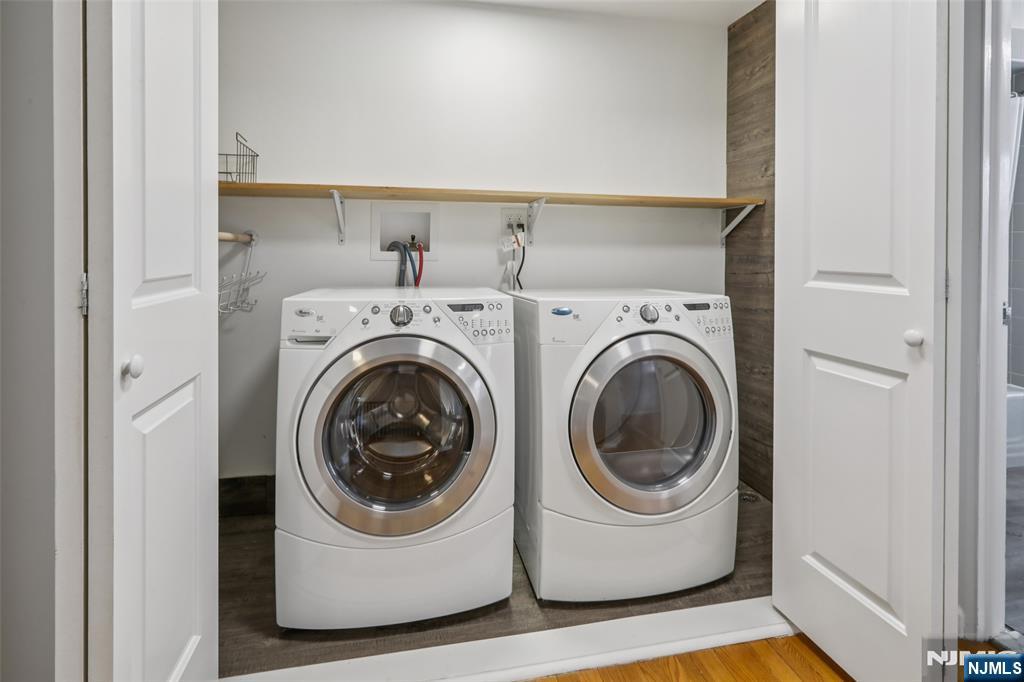 53 Forest Road Demarest, NJ 07627 - Photo 14 of 17 a utility room with dryer and washer