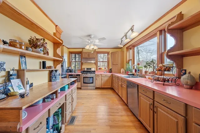 a kitchen with lots of counter top space and a sink