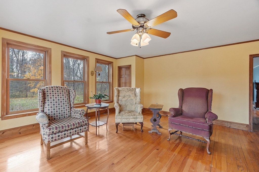 320 Old Ayer Road Groton, MA 01450 - Photo 29 of 42 a living room with furniture and wooden floor
