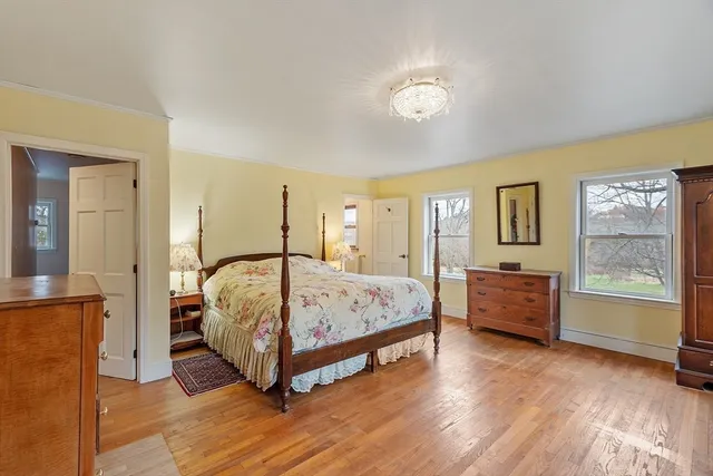 a bathroom with a sink a toilet and shower curtain