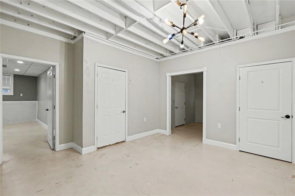 19 Safe Harbor Trail Dallas, GA 30157 - Photo 13 of 28 a view of a hallway with a chandelier