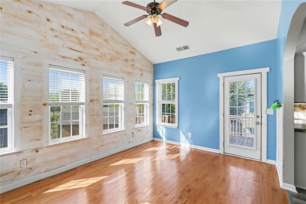 19 Safe Harbor Trail Dallas, GA 30157 - Photo 15 of 28 a view of an empty room with a window and wooden floor