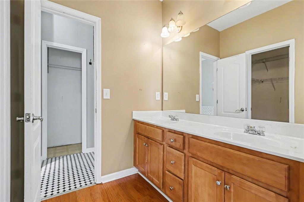 19 Safe Harbor Trail Dallas, GA 30157 - Photo 21 of 28 a spacious bathroom with a sink a mirror and a shower