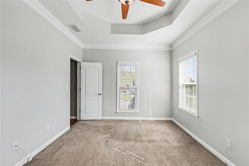 19 Safe Harbor Trail Dallas, GA 30157 - Photo 22 of 28 a view of an empty room with window and cabinet