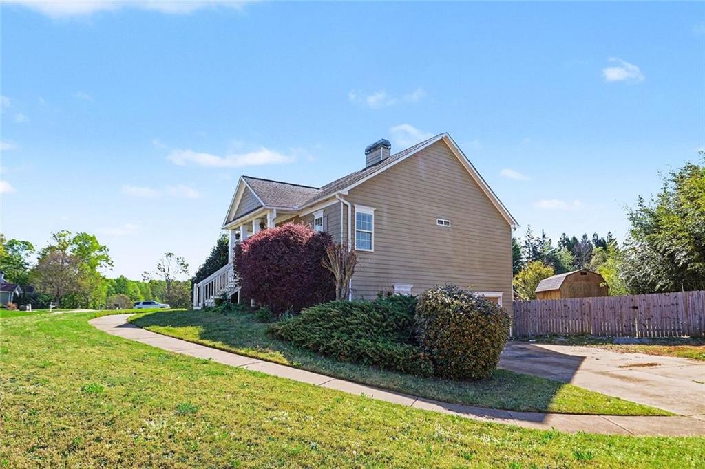 19 Safe Harbor Trail Dallas, GA 30157 - Photo 25 of 28 a house view with a garden space