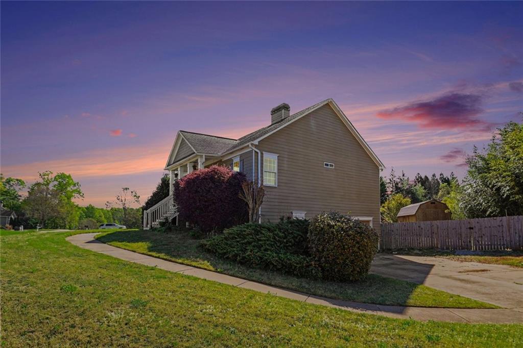 19 Safe Harbor Trail Dallas, GA 30157 - Photo 27 of 28 a house view with a garden space