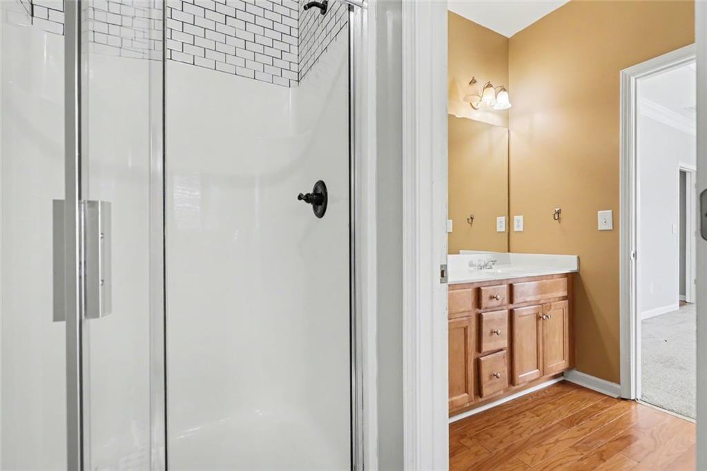 19 Safe Harbor Trail Dallas, GA 30157 - Photo 9 of 28 a view of bathroom with a shower and a sink