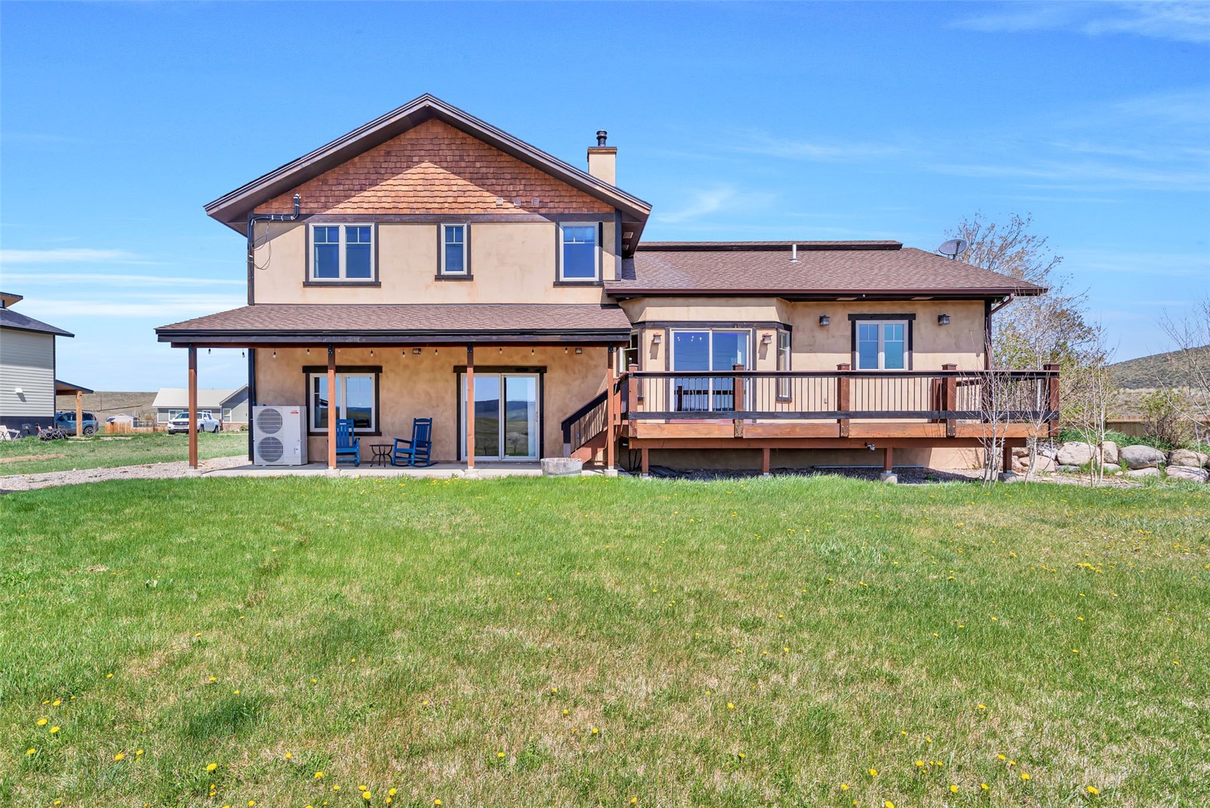 938 South Dry Creek Road Hayden, CO 81639 - Photo 5 of 34 a front view of a house with a yard and porch