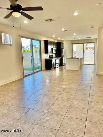 a view of large windows and an entryway in a room