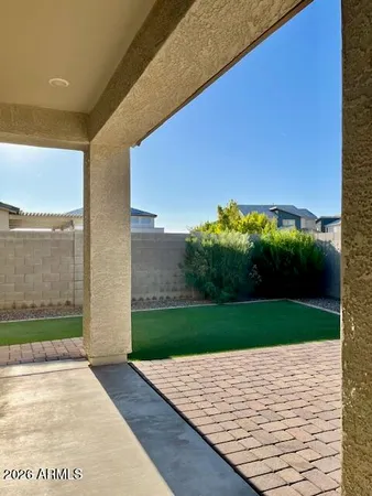 a wooden bench sitting in the middle of a building