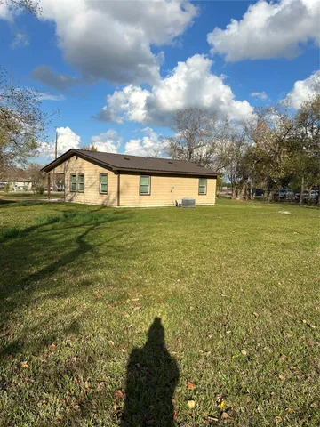a view of a big yard next to a yard