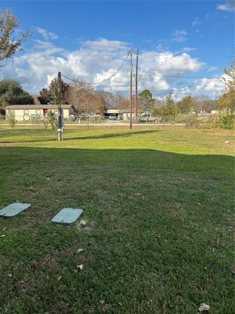 a view of a golf course with a lake