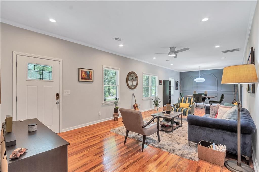 2418 Bolling Brook Drive Southwest Atlanta, GA 30311 - Photo 3 of 37 a living room with furniture and a table