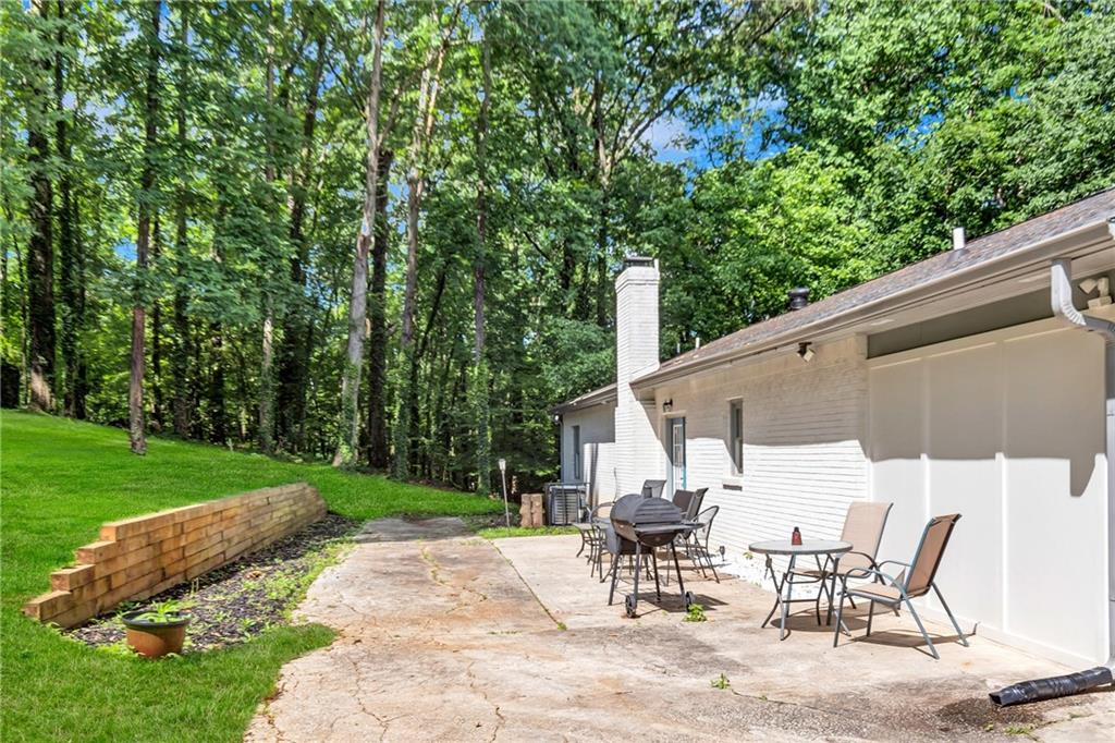 2418 Bolling Brook Drive Southwest Atlanta, GA 30311 - Photo 36 of 37 a view of outdoor space with table and chairs