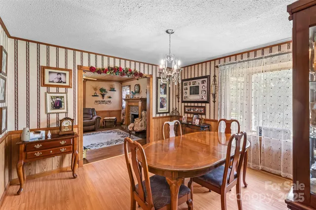 a dining room with furniture window wooden floor