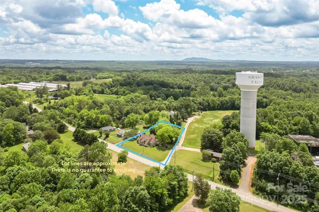 a view of a garden with houses