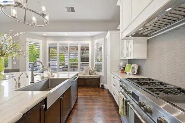 a living room with fireplace furniture and a flat screen tv