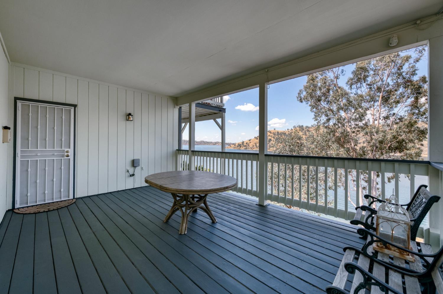 28037 Sky Harbour Road Friant, CA 93626 - Photo 30 of 40 a view of a room with furniture wooden floor and front door